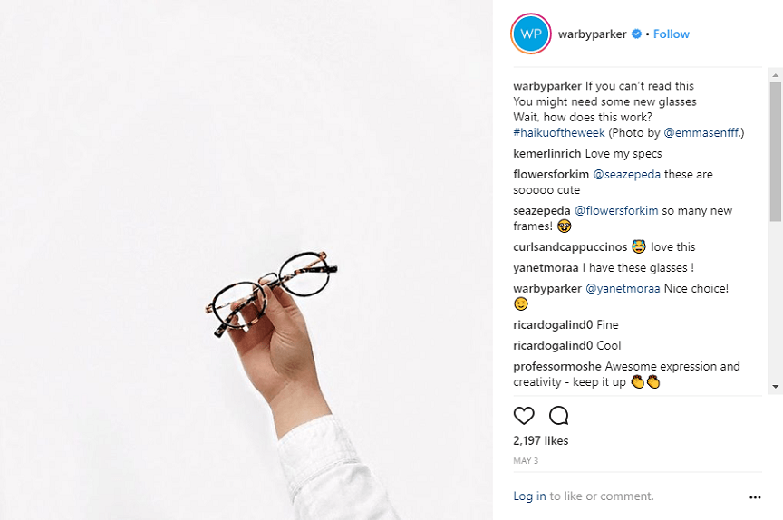 Warby Parker Instagram Post of a hand holding up a pair of glasses